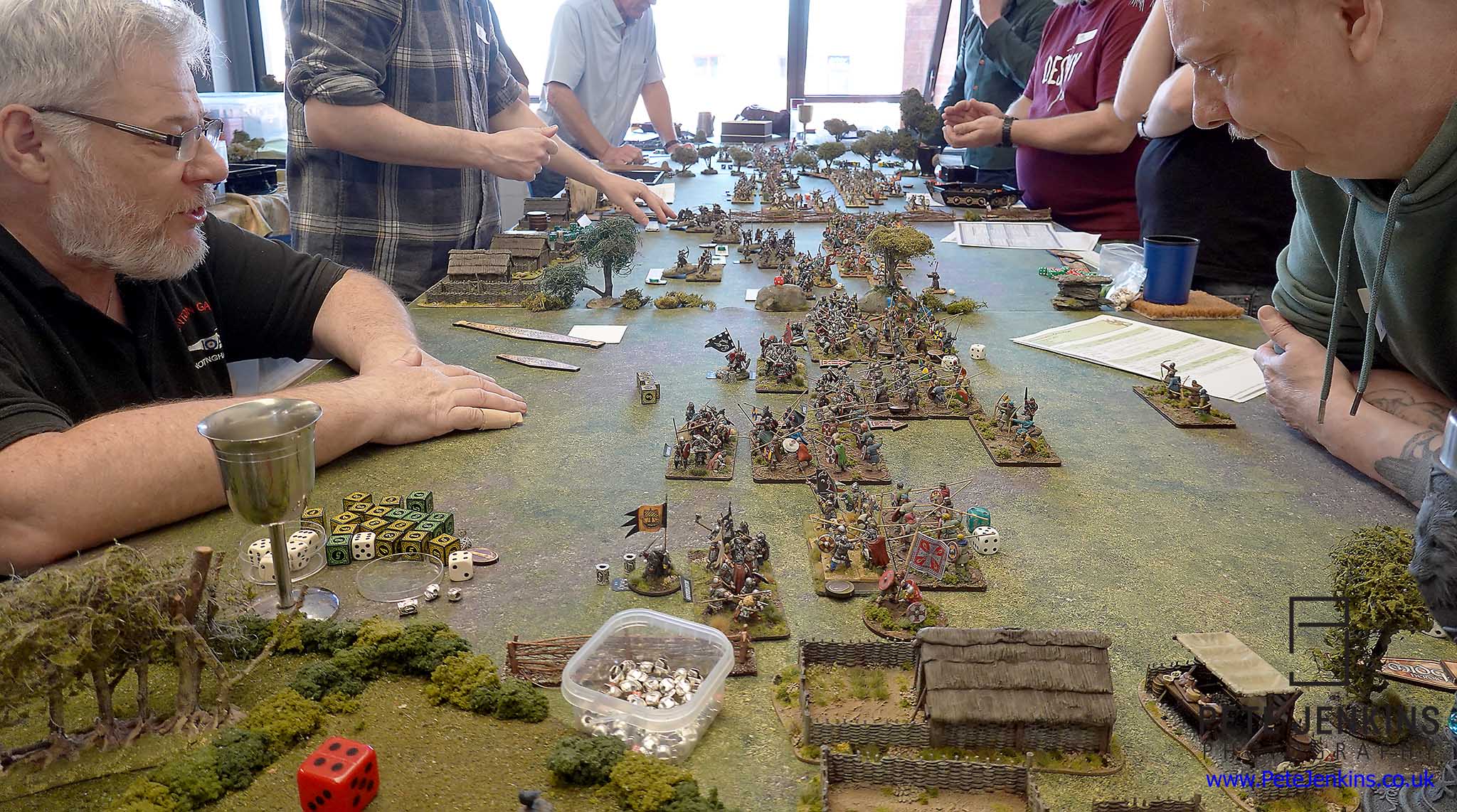 Large 28mm Midgard
                game in progress with Vikings and Saxons, plus
                wargamers