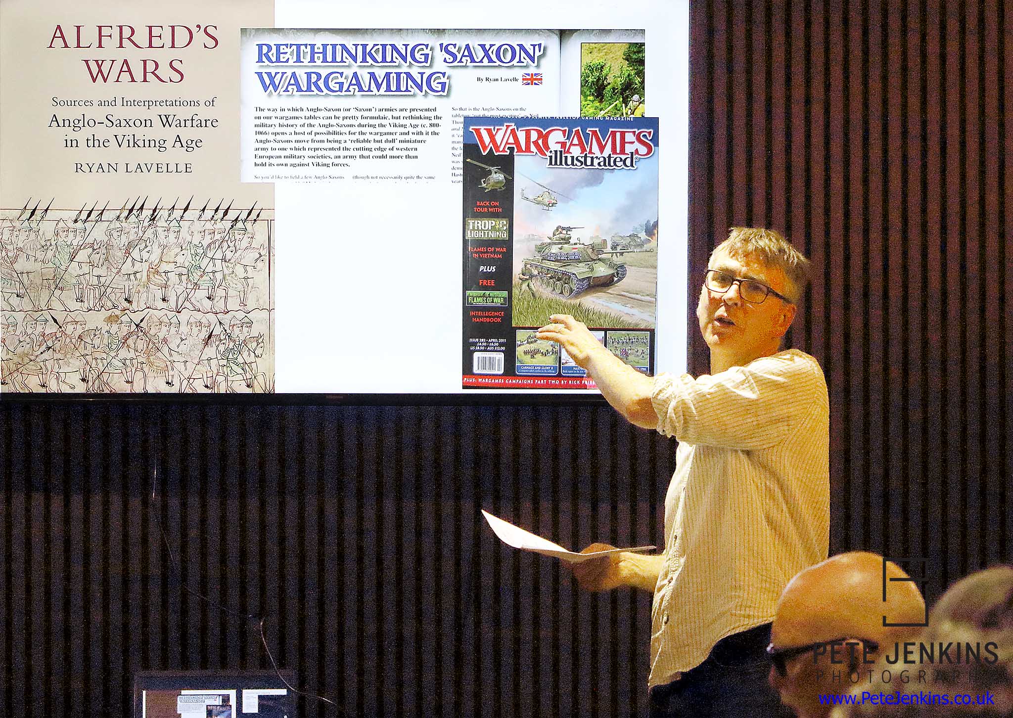 Ryan speaking to an
                audience at the Midgard Moot 2026 event, on Saxon
                Wargaming, in relation to his Alfred's Wars book