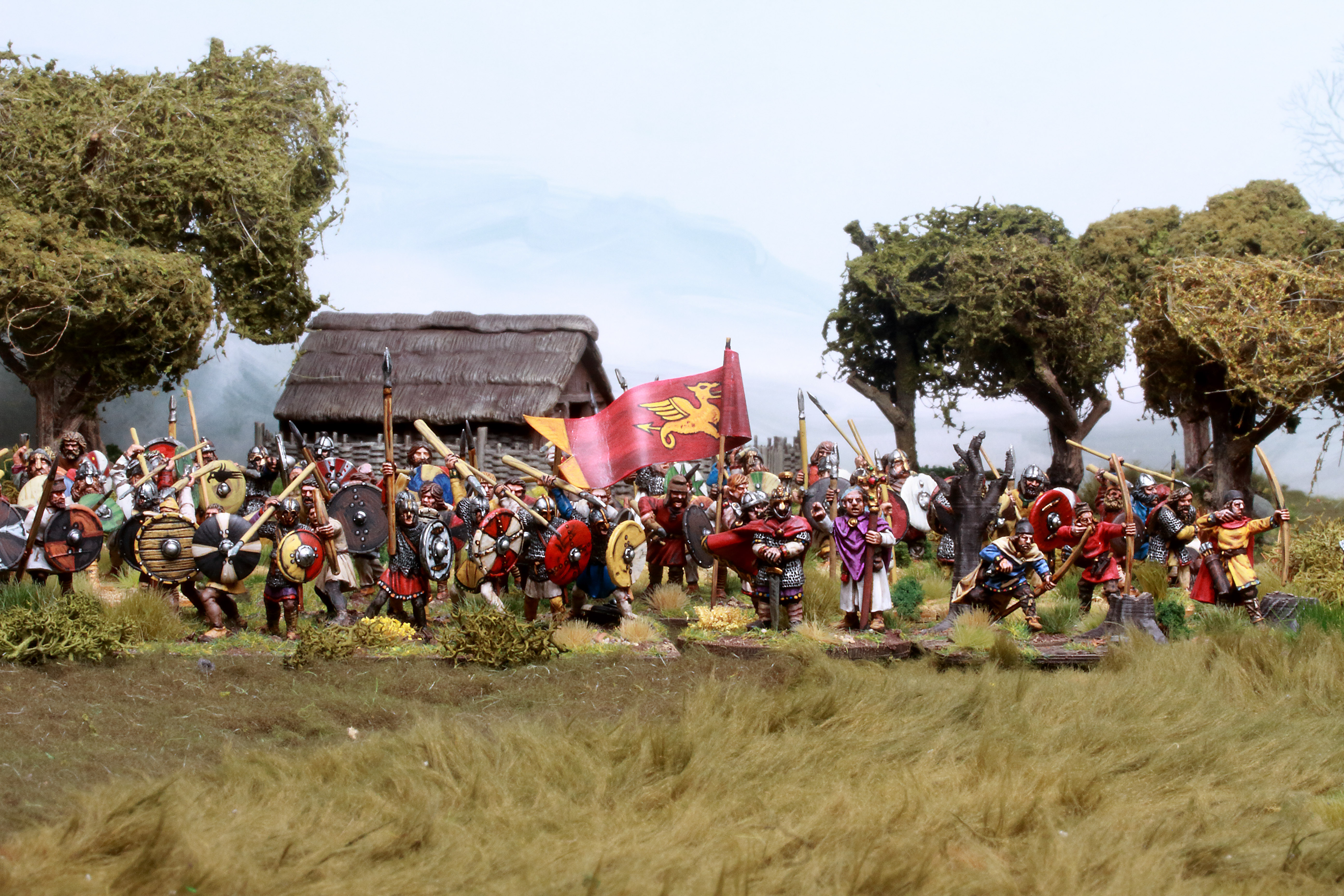 West Saxon
                force of 28mm models lined up with banners